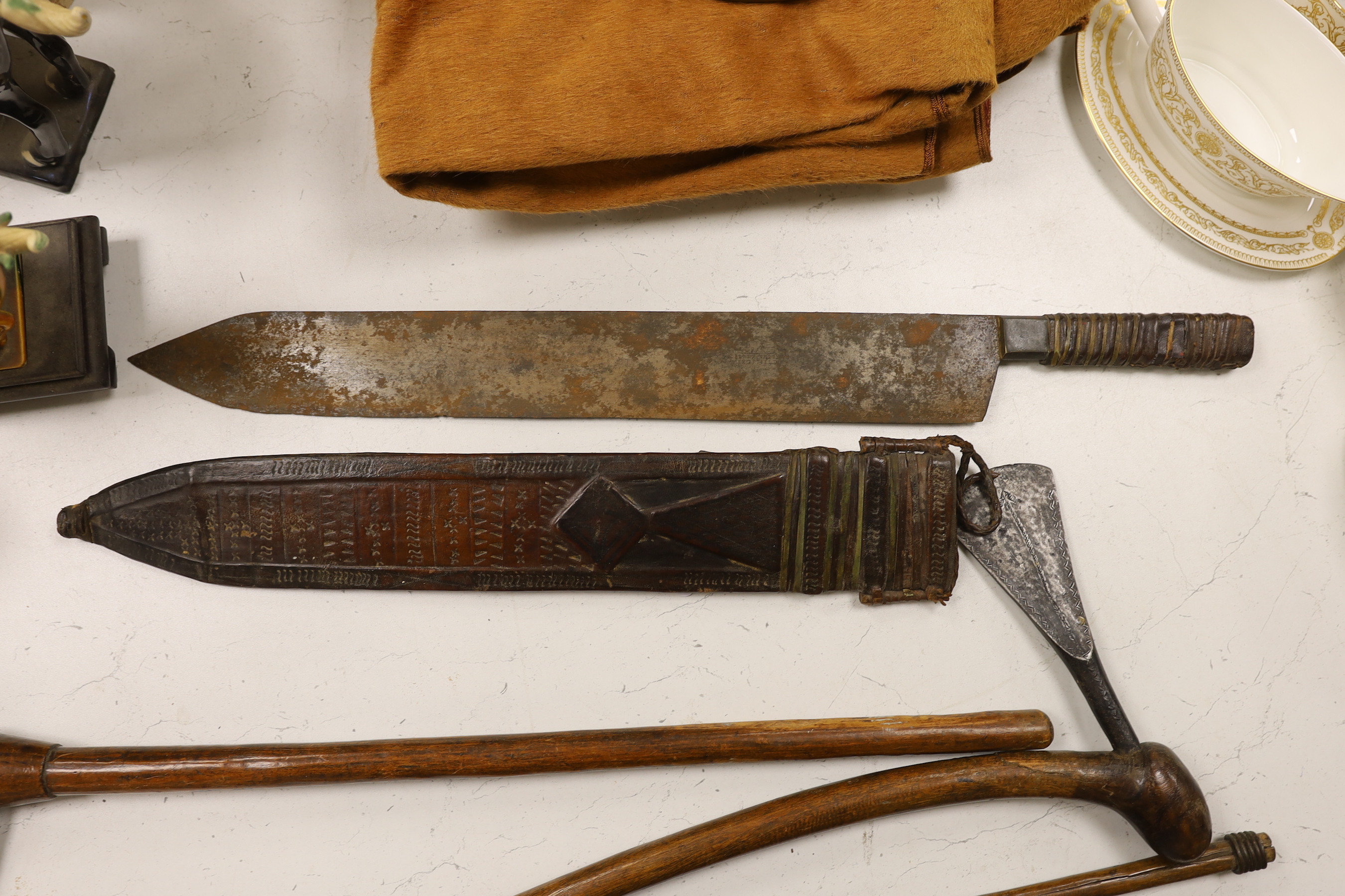 Zulu weapons and a machete, the blade stamped ‘Grape? Robert. M. Needham Sheffield’